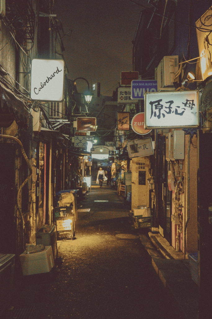 "Midnight at the Golden Gai" by Mike Kniec is licensed under CC BY 2.0