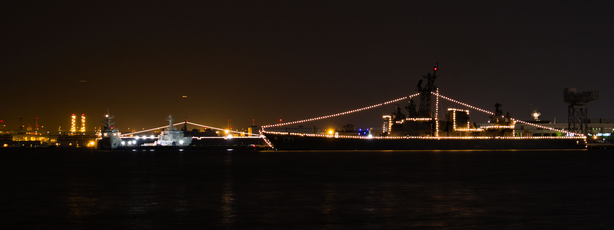 Illuminated Naval Ships at Yokohama Bay at Night